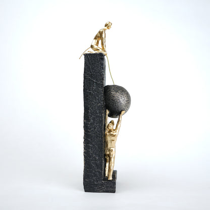 Teamwork figurine sculpture lifting sphere on textured stone base in black and white variants