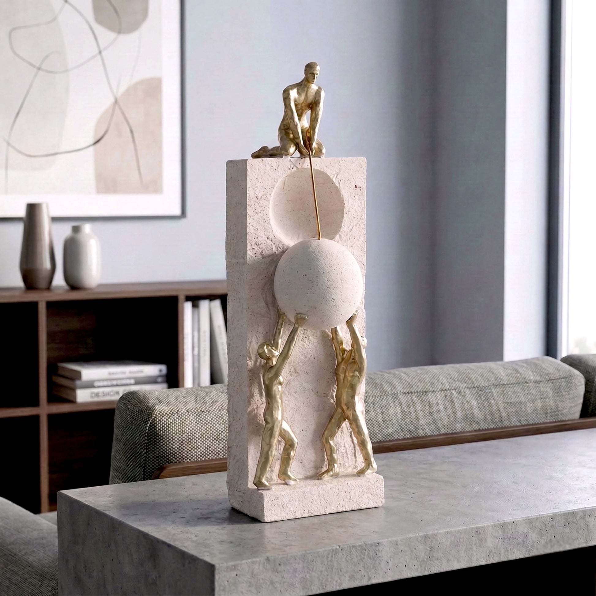 Teamwork figurine sculpture lifting sphere on textured stone base in black and white variants