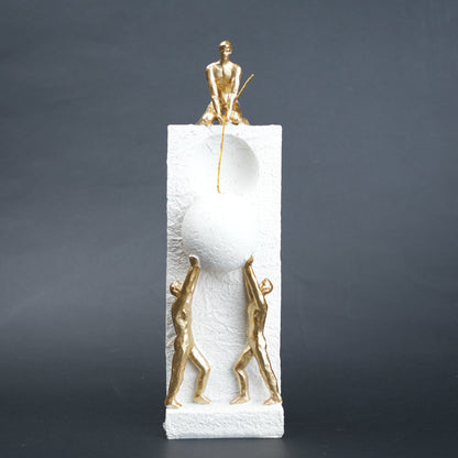 Teamwork figurine sculpture lifting sphere on textured stone base in black and white variants