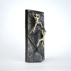 modern climbing figurine with gold climbers on textured rock base for home and office decor