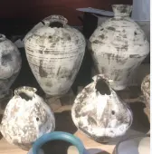 Distressed antique ceramic decorative vases with textured rustic finish in sculptural pottery shapes