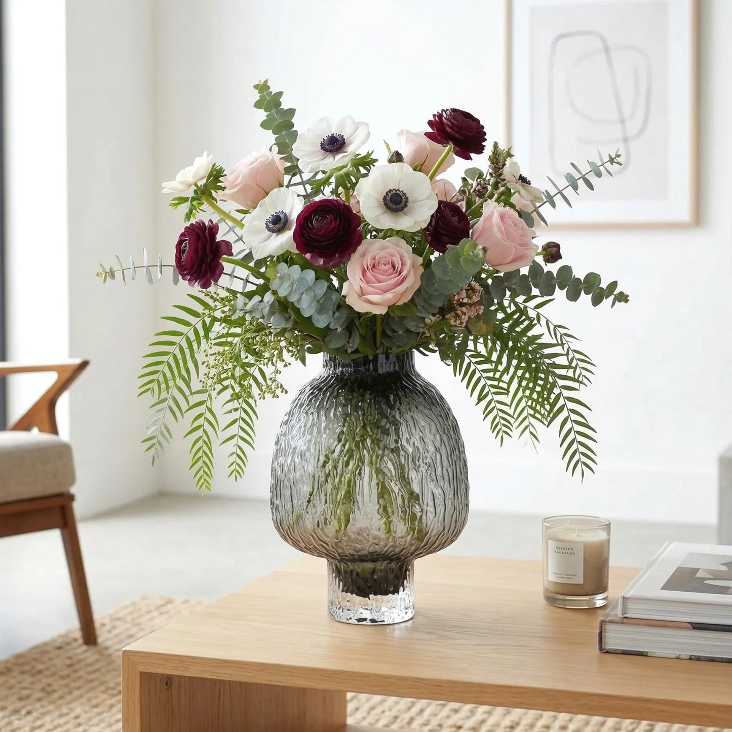 Olive charcoal urn vase w/ anemone on oak