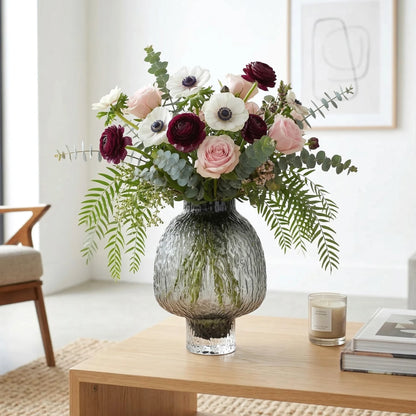 Olive charcoal urn vase w/ anemone on oak