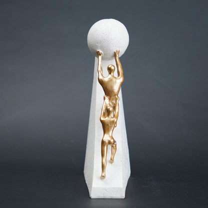 Mountain climber leadership sculpture with gold figurines guiding metallic sphere on textured stone base in black and white variants