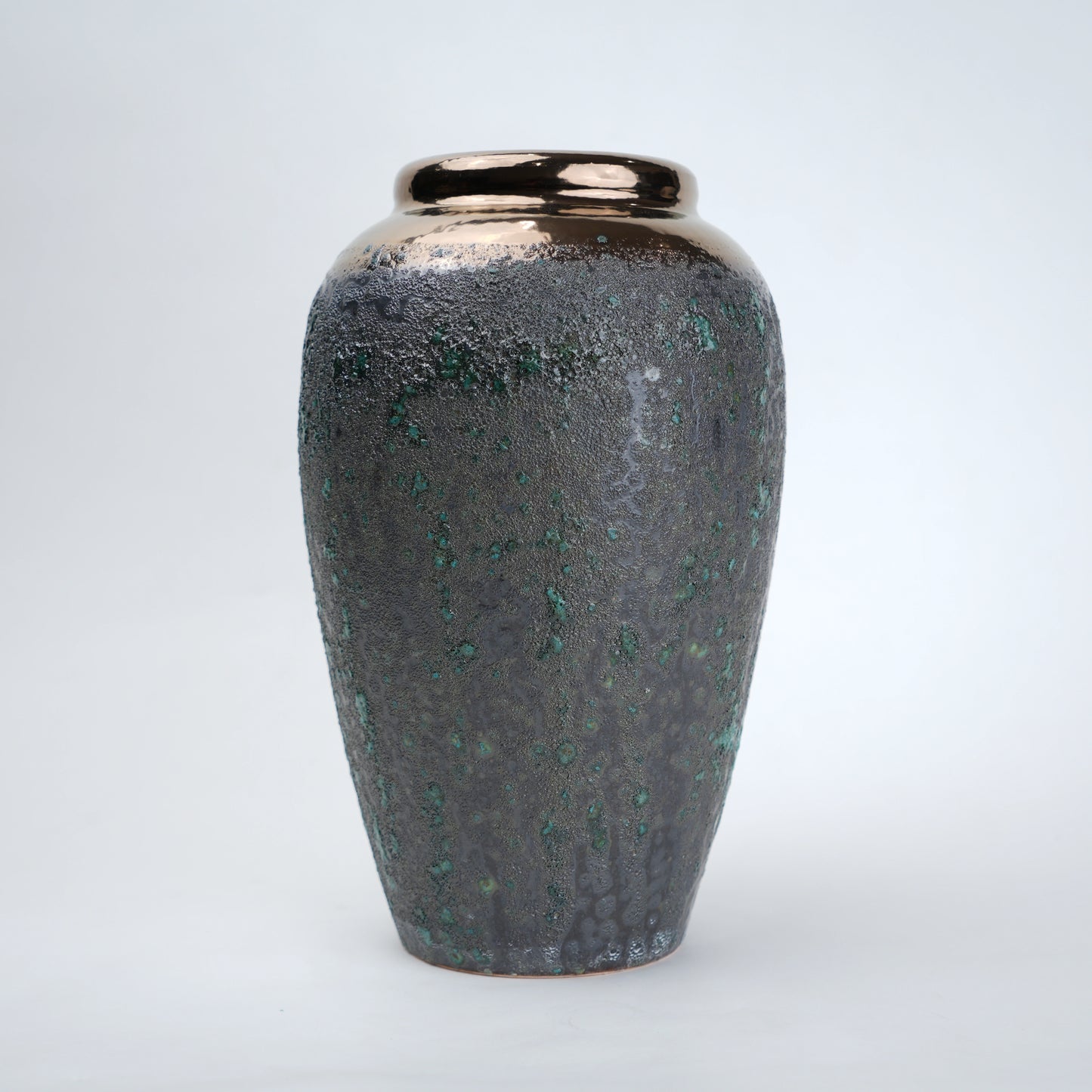 green charcoal ceramic vase with patina texture and bronze neck