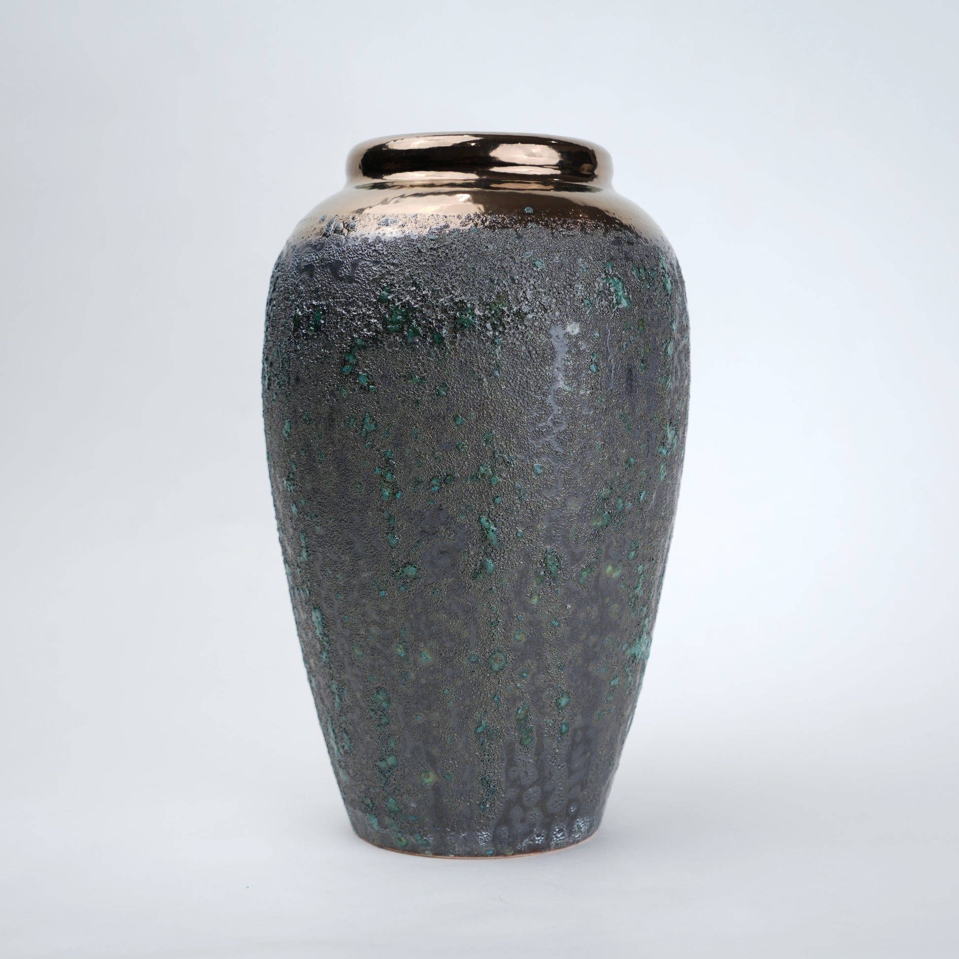 green charcoal ceramic vase with patina texture and bronze neck