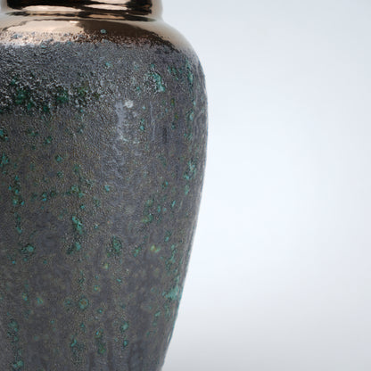green charcoal ceramic vase with patina texture and bronze neck