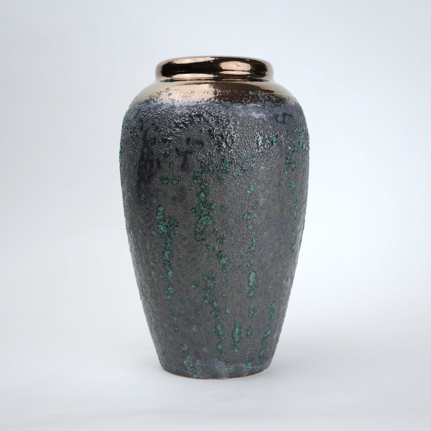 green charcoal ceramic vase with patina texture and bronze neck