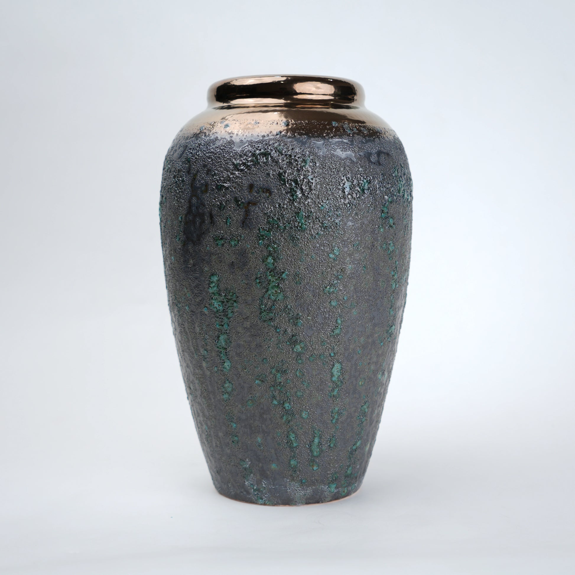 green charcoal ceramic vase with patina texture and bronze neck