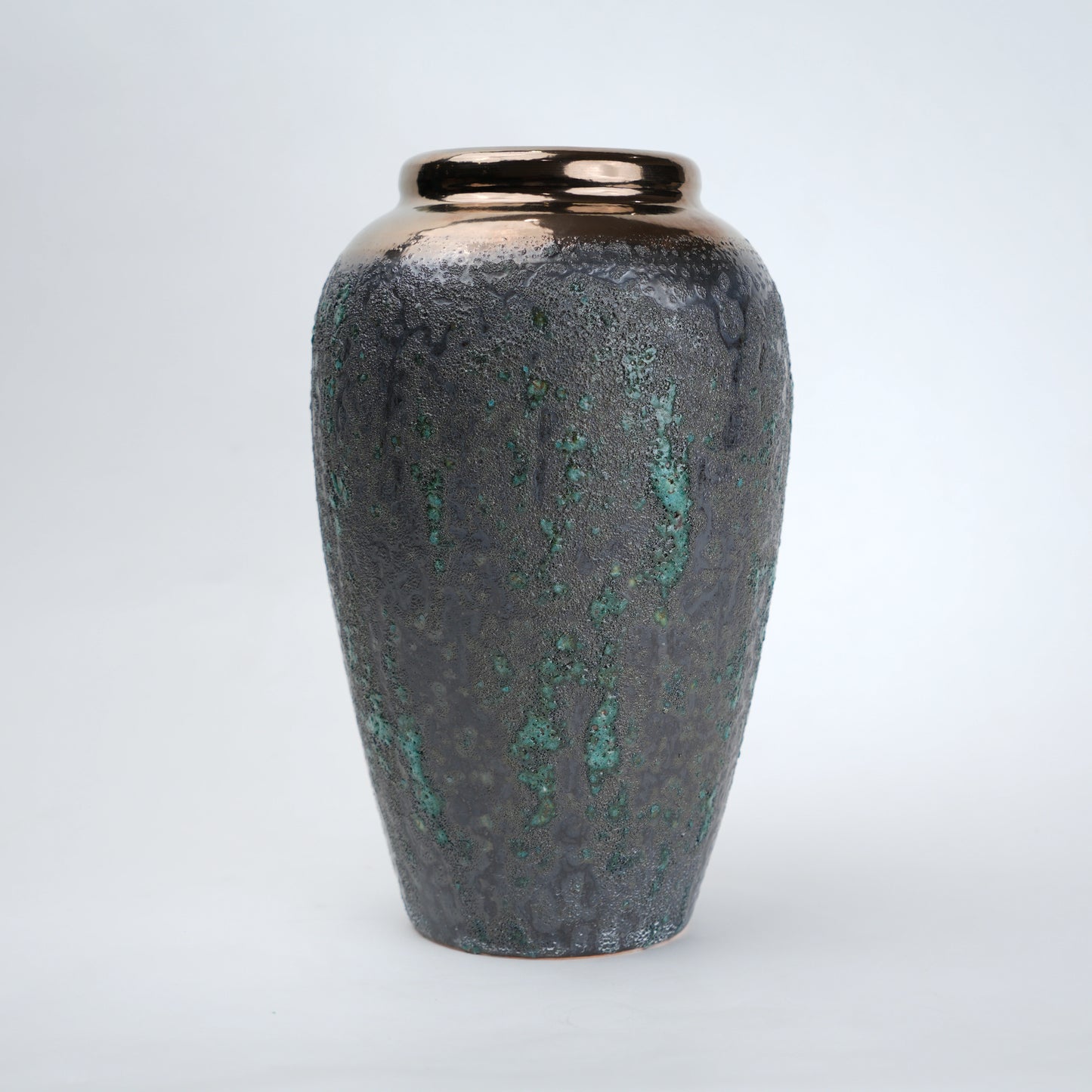 green charcoal ceramic vase with patina texture and bronze neck