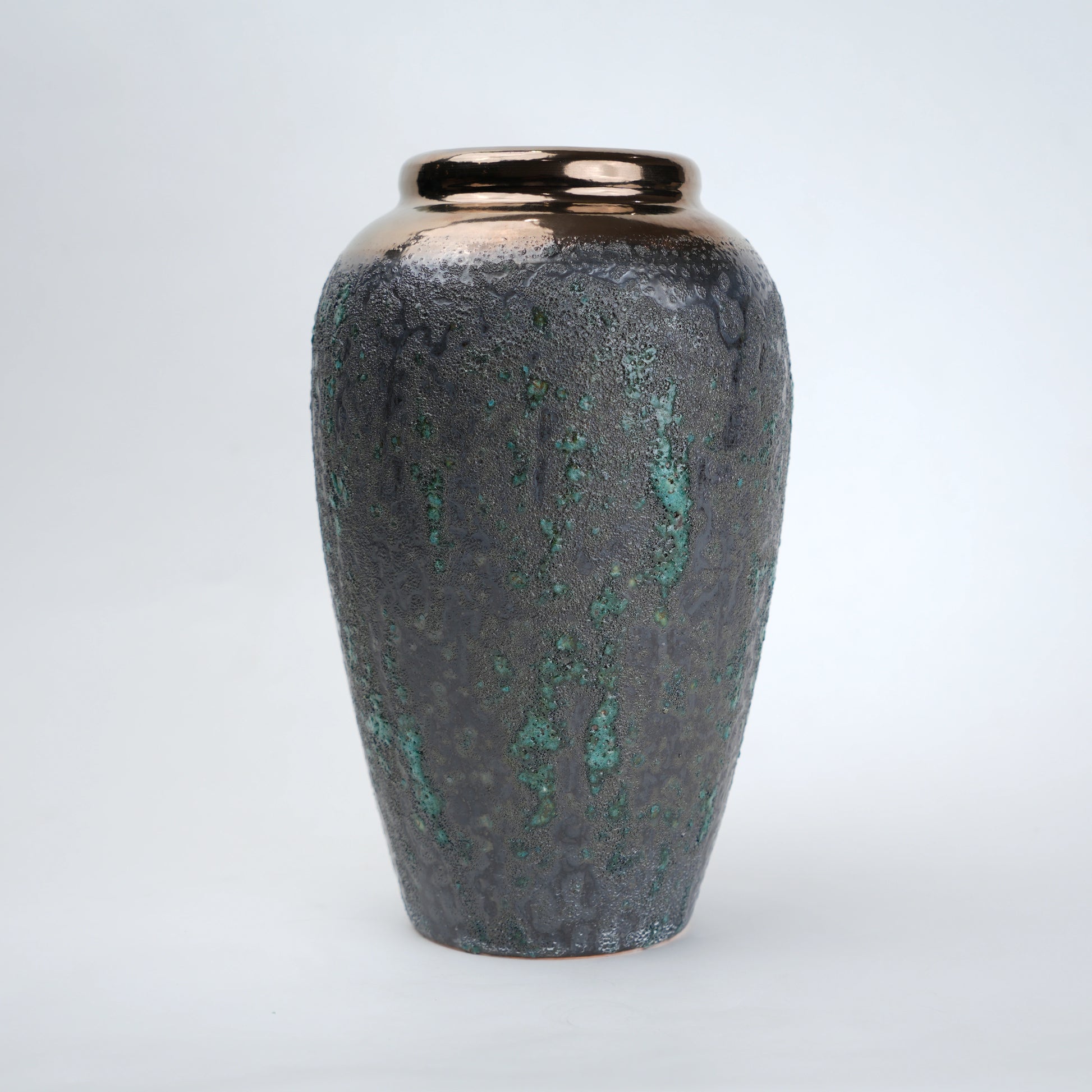 green charcoal ceramic vase with patina texture and bronze neck