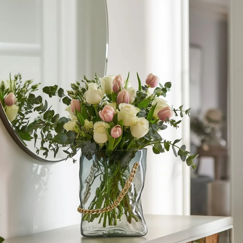 Big gold chain tote vase w/ tulips, entry