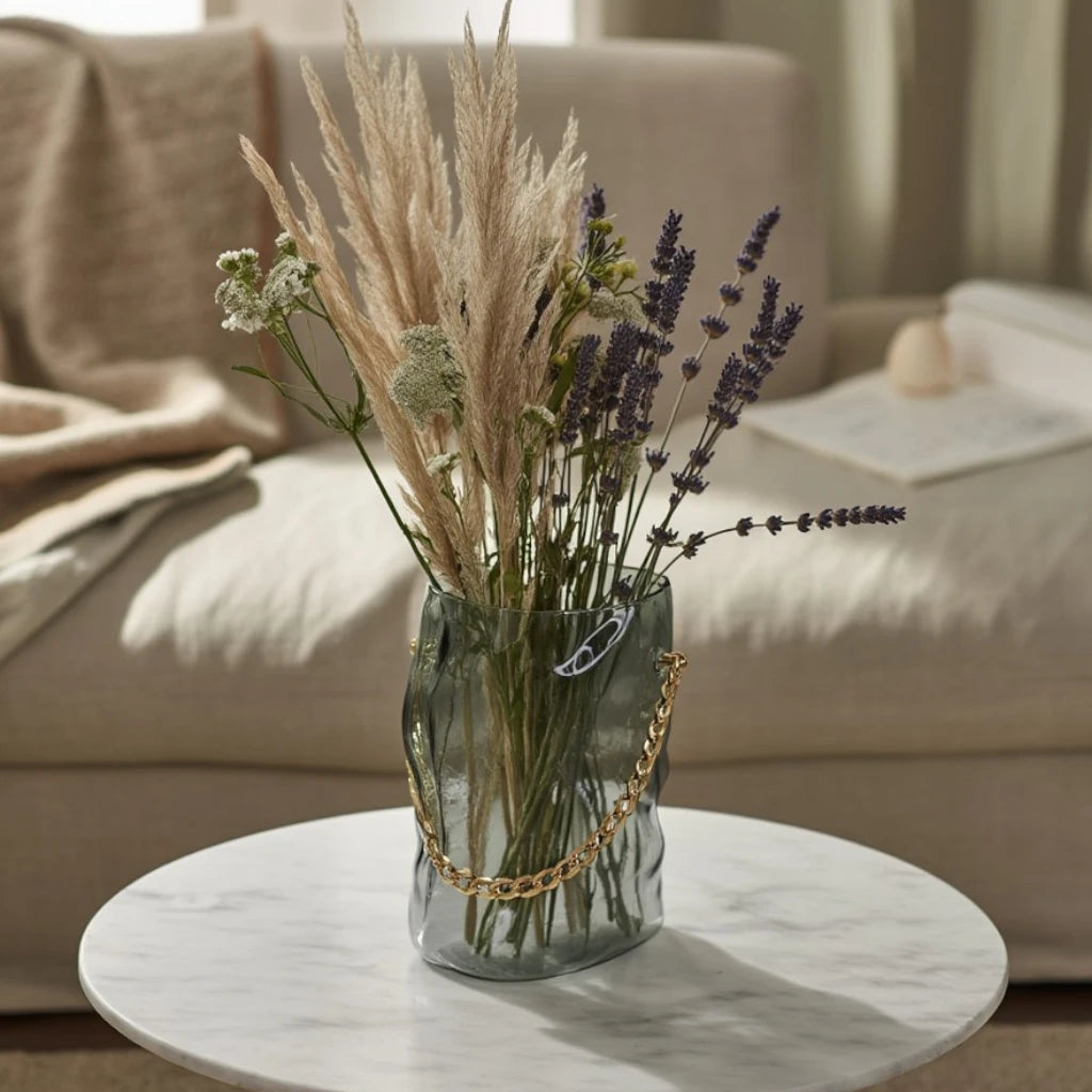 Big gold chain vase w/ pampas on marble