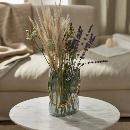 Big gold chain vase w/ pampas on marble