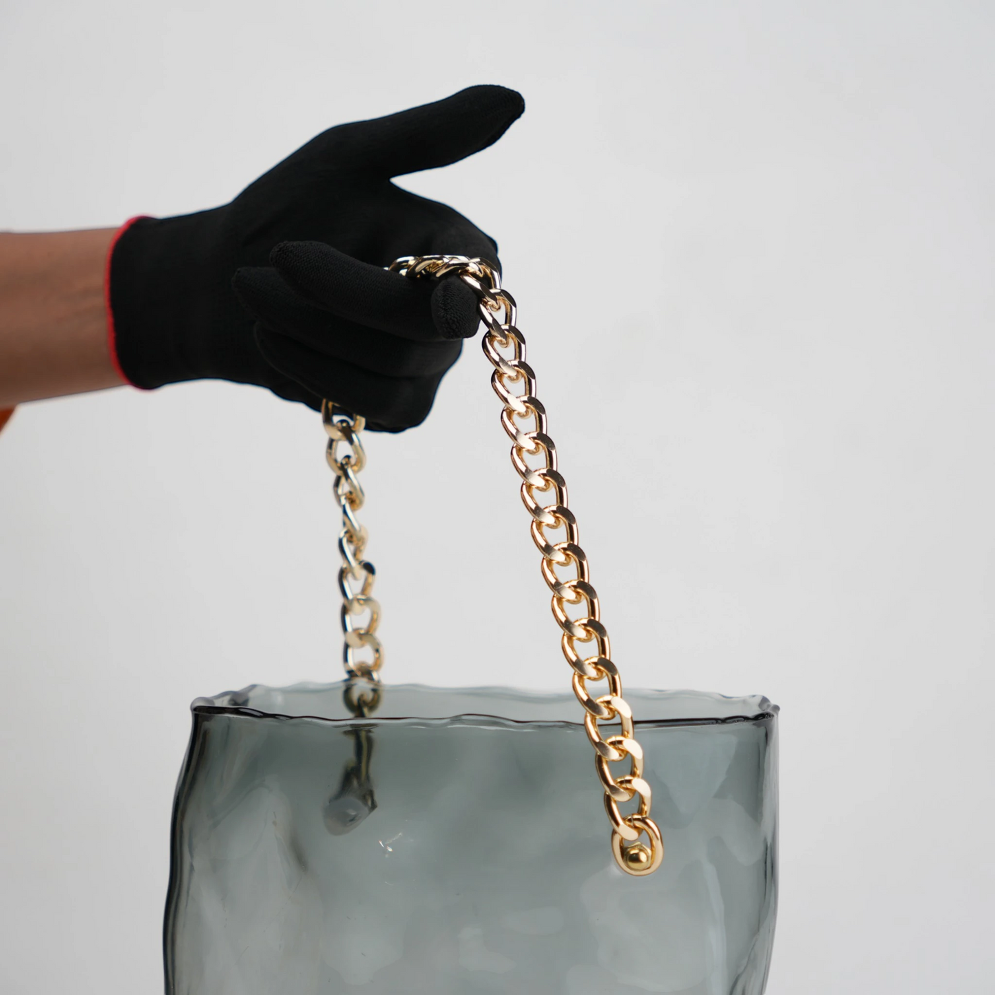 grey chain glass vase with gold chain detail
