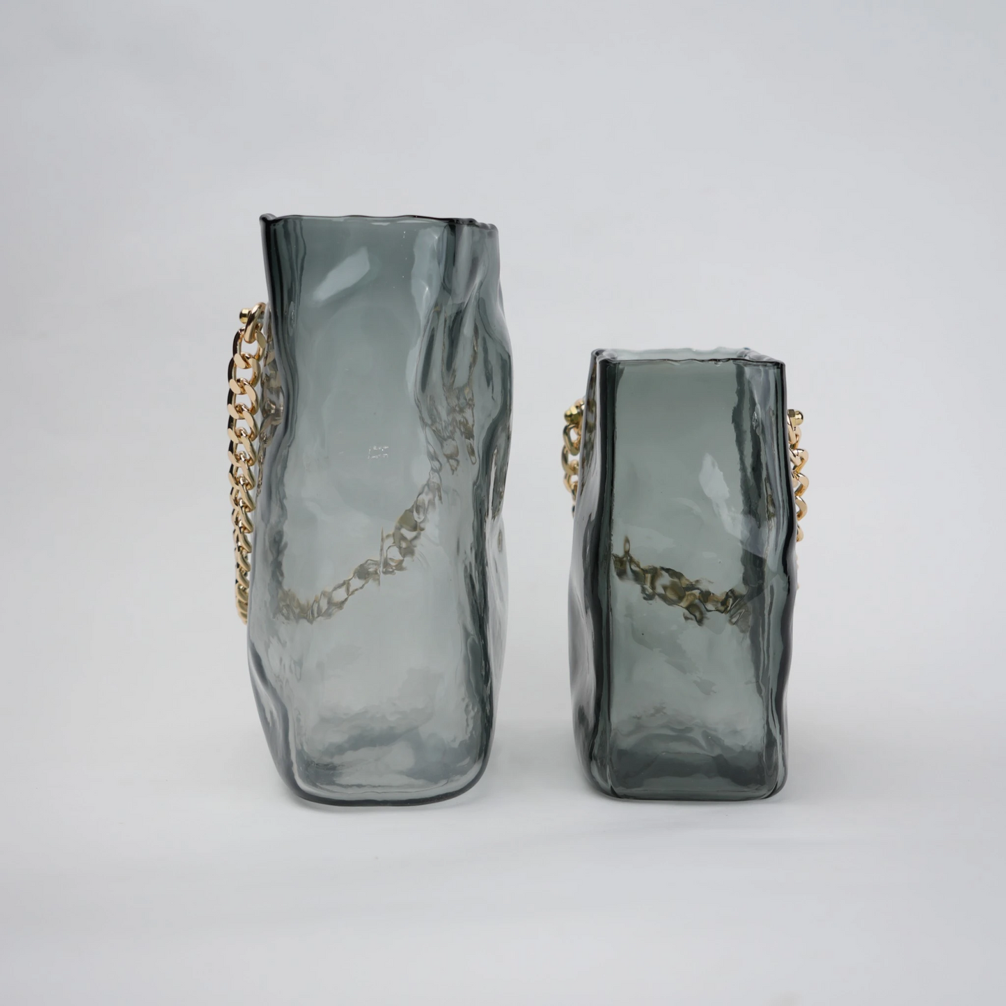 grey chain glass vase with gold chain detail