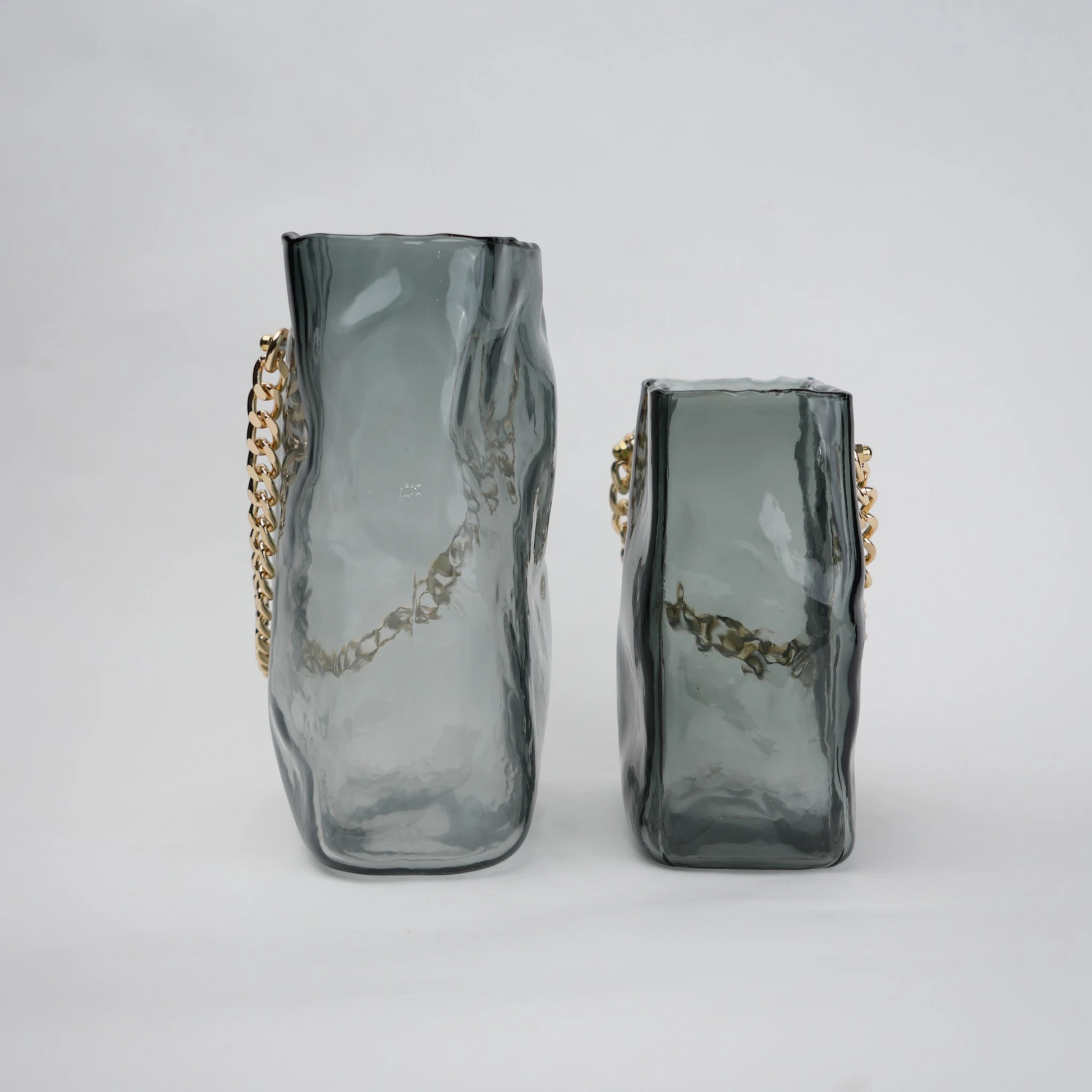 grey chain glass vase with gold chain detail