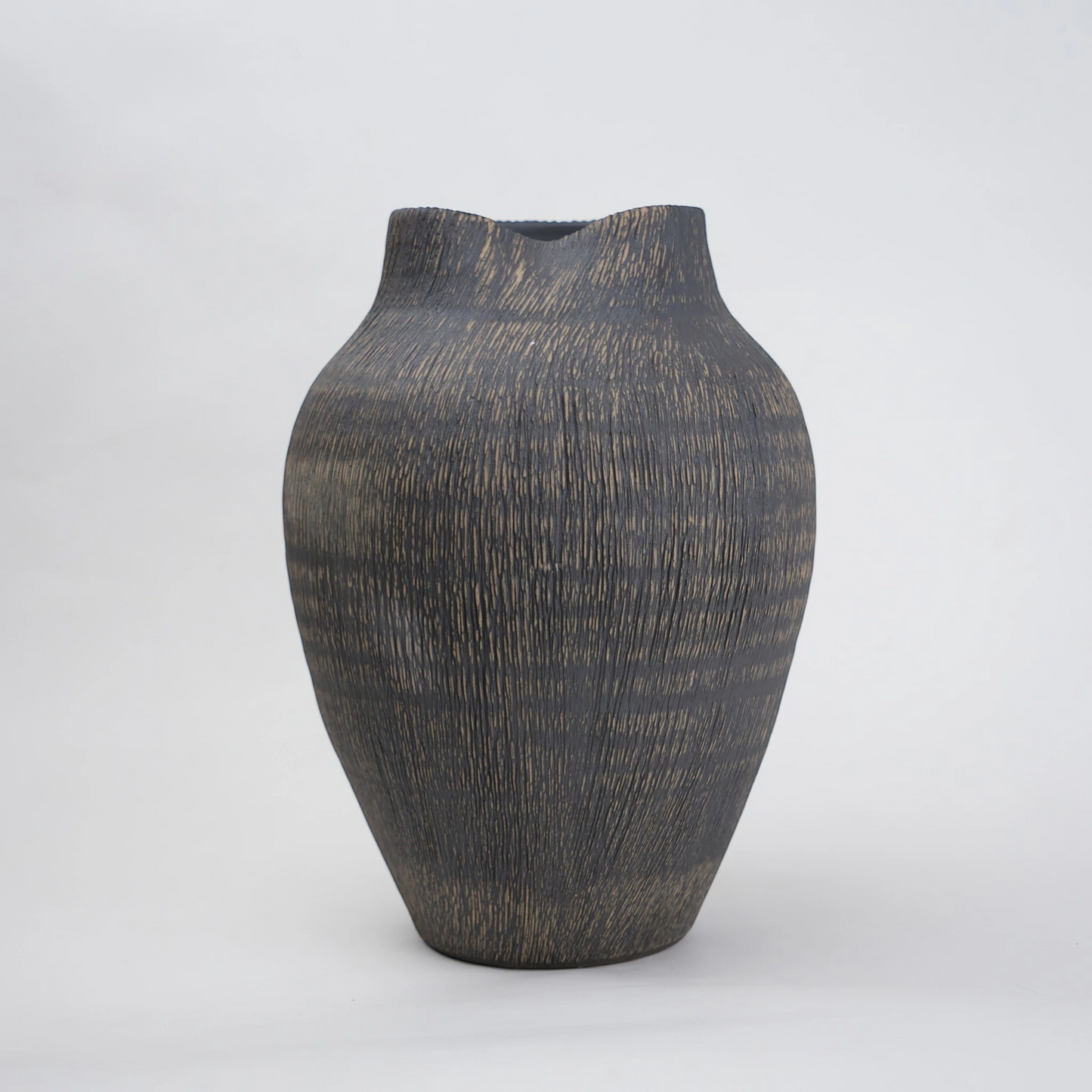 textured charcoal ceramic vase with angled rim