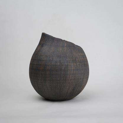 textured charcoal ceramic vase with angled rim