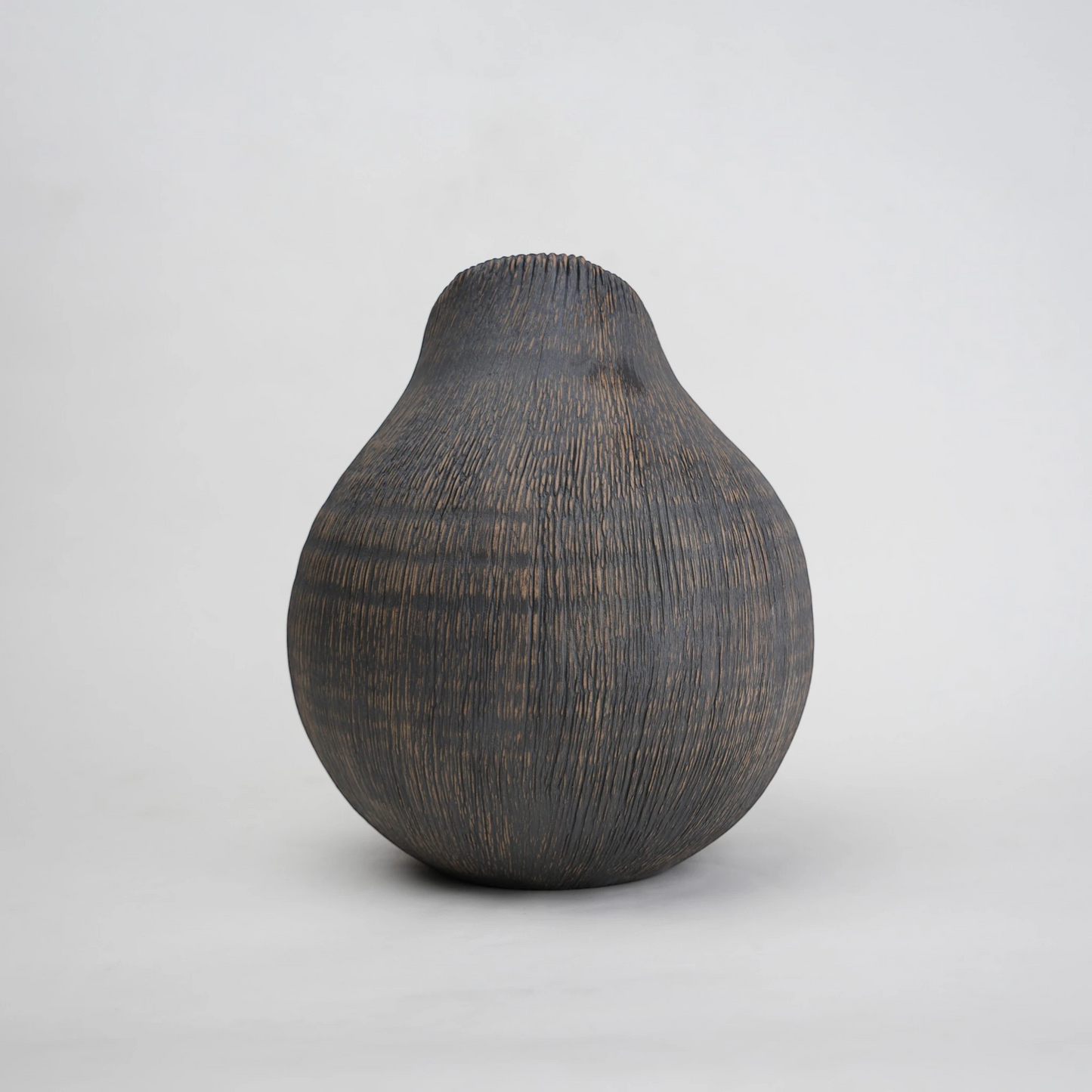 Textured charcoal gourd vase, side angle