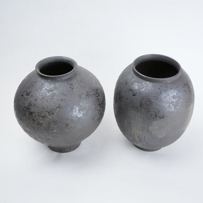 Two gray ceramic vases for styling flowers in living room, coffee tables or consoles