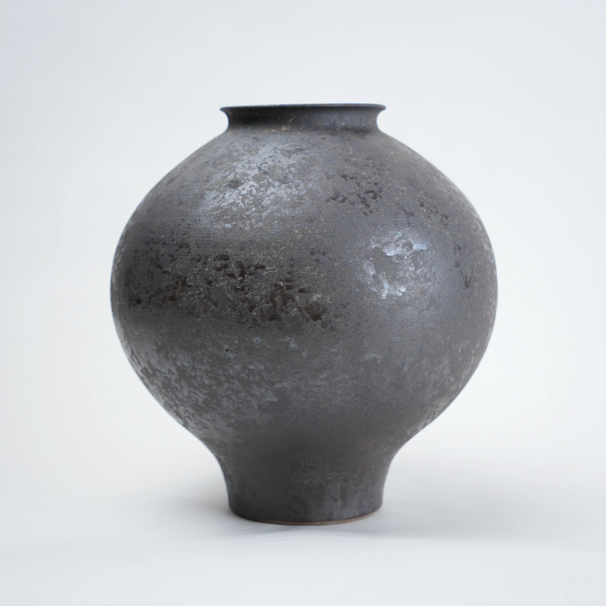 Two gray ceramic vases for styling flowers in living room, coffee tables or consoles