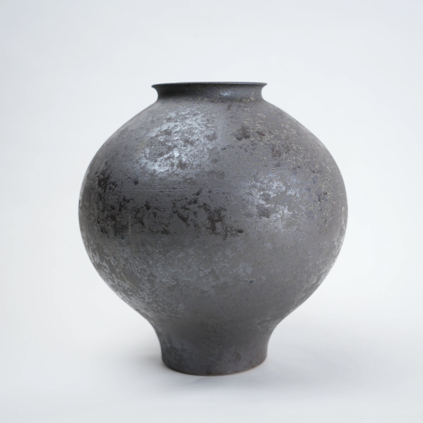 Two gray ceramic vases for styling flowers in living room, coffee tables or consoles