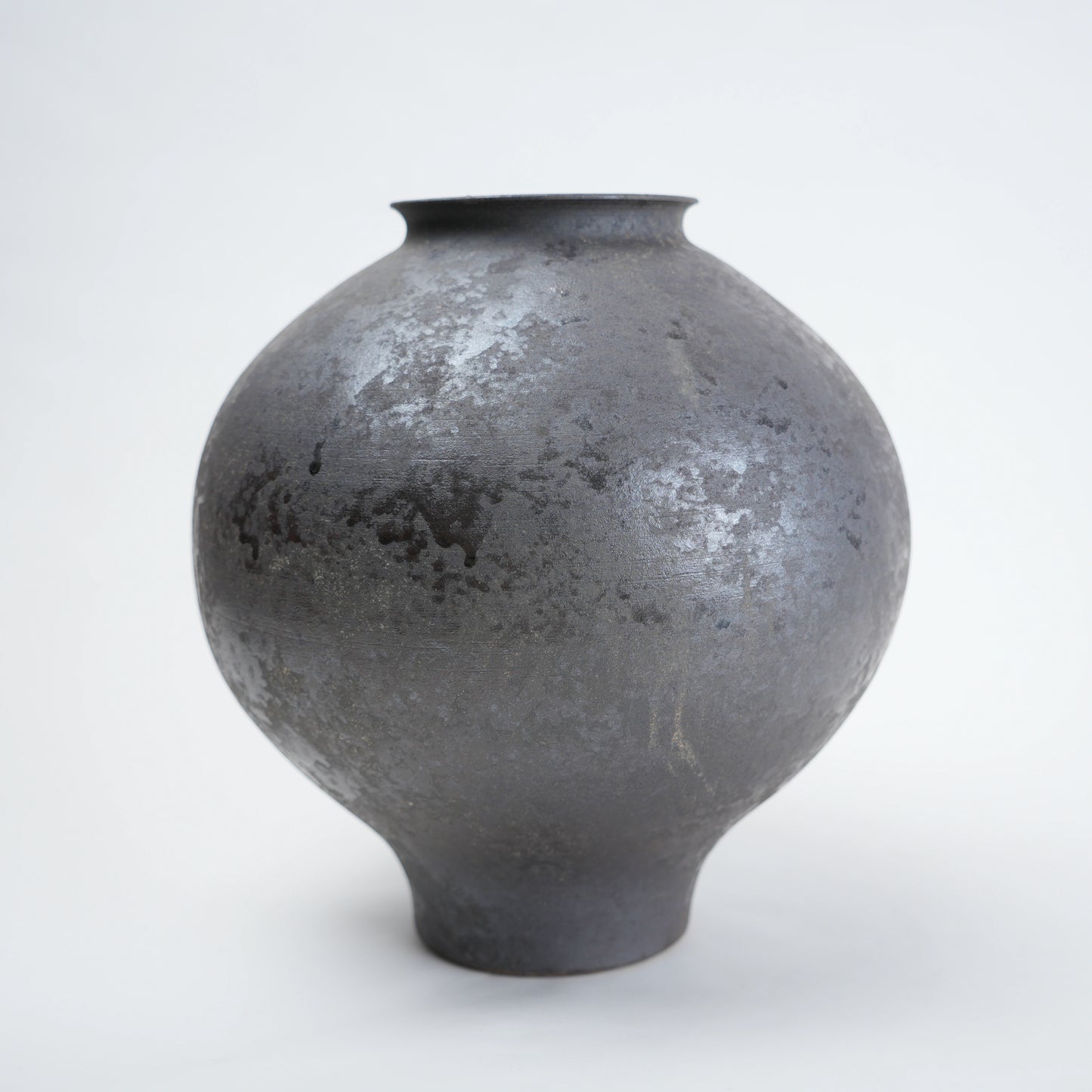 Two gray ceramic vases for styling flowers in living room, coffee tables or consoles