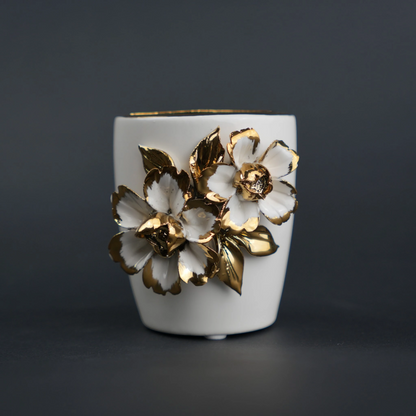 White ceramic holder cup with gold floral detailing for bathroom and desk organization