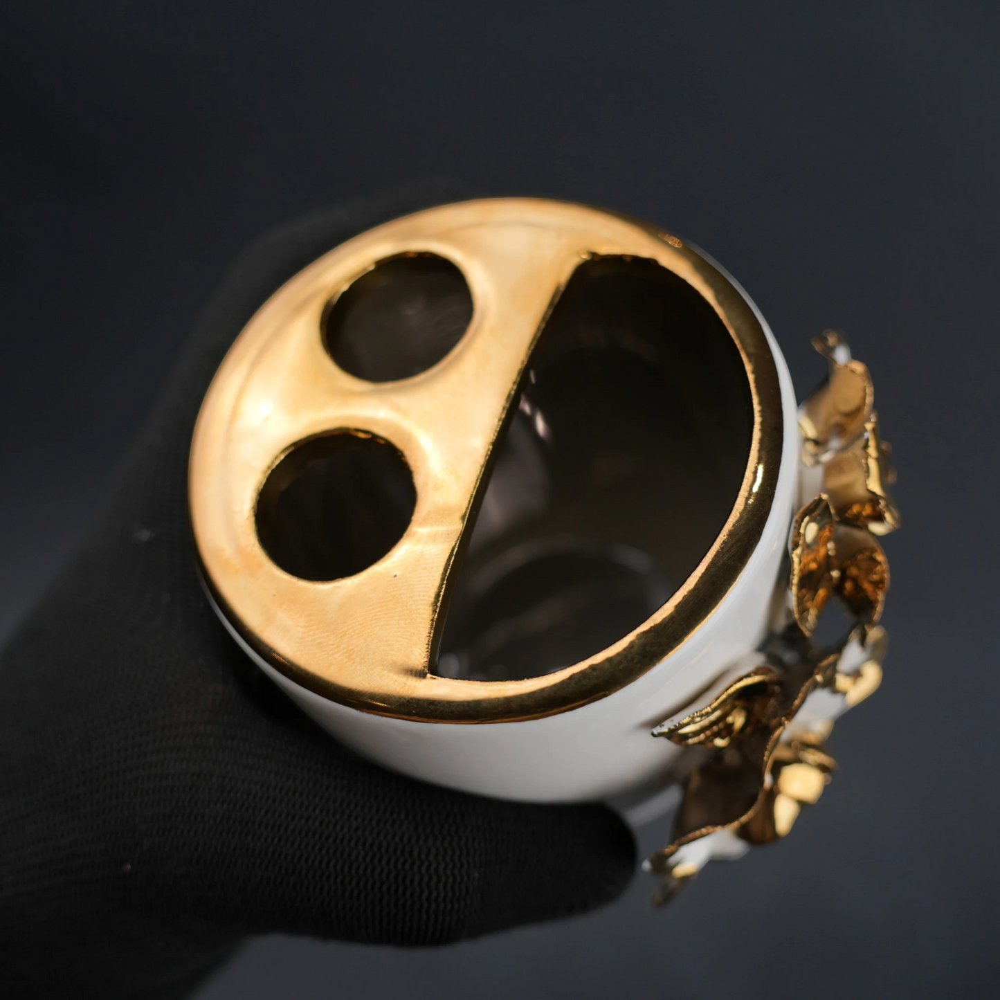 White ceramic holder cup with gold floral detailing for bathroom and desk organization