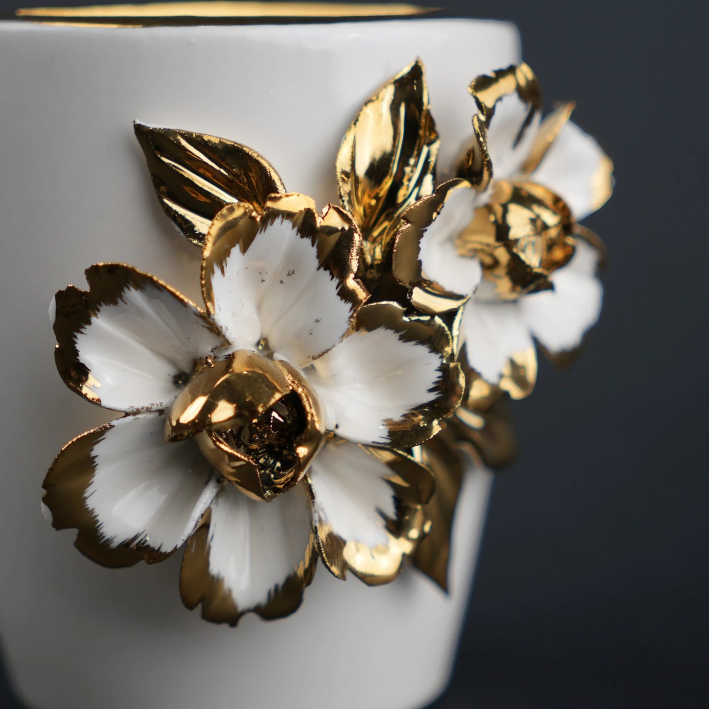 White ceramic holder cup with gold floral detailing for bathroom and desk organization