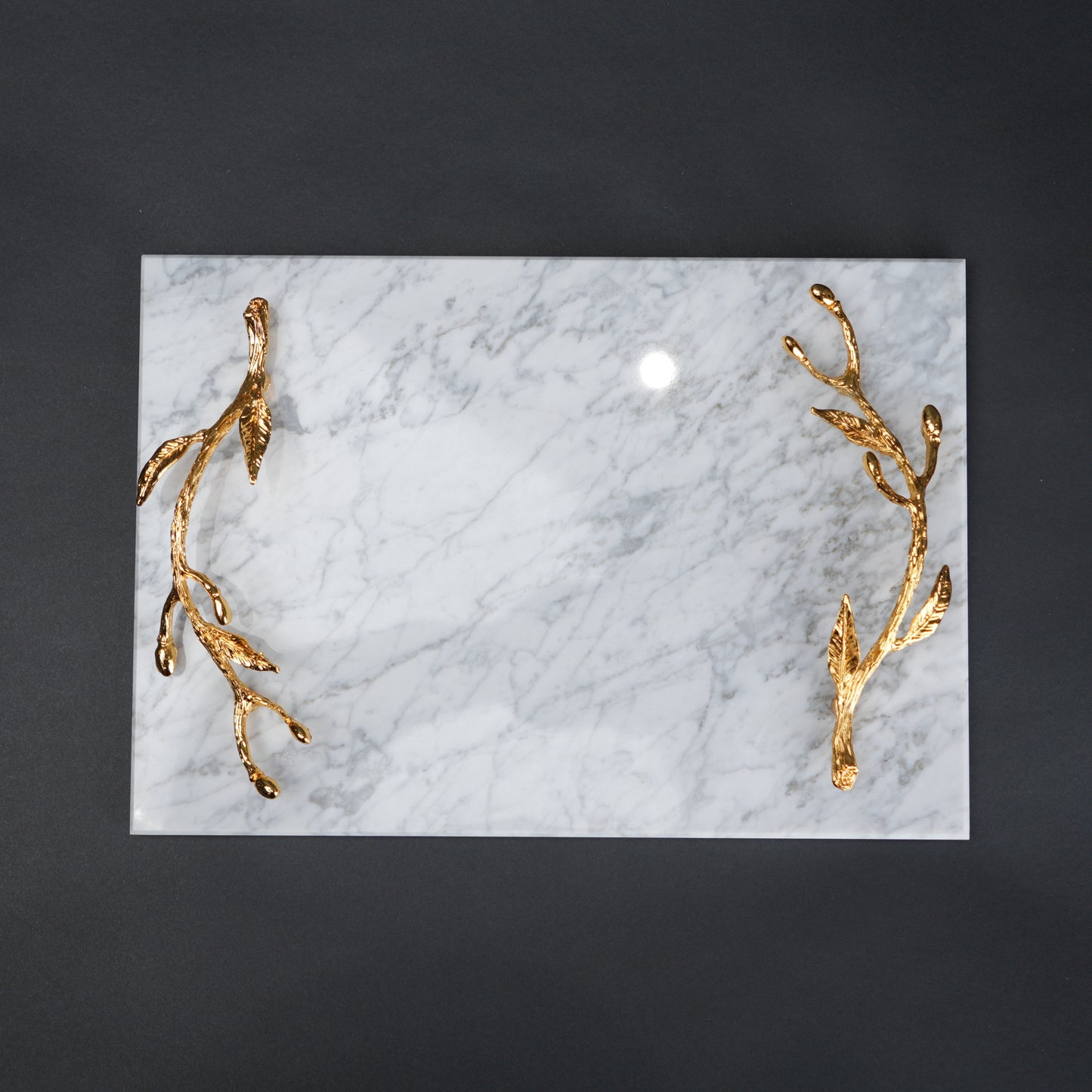 White marble serving platter with gold branch handles for luxury dining and table styling
