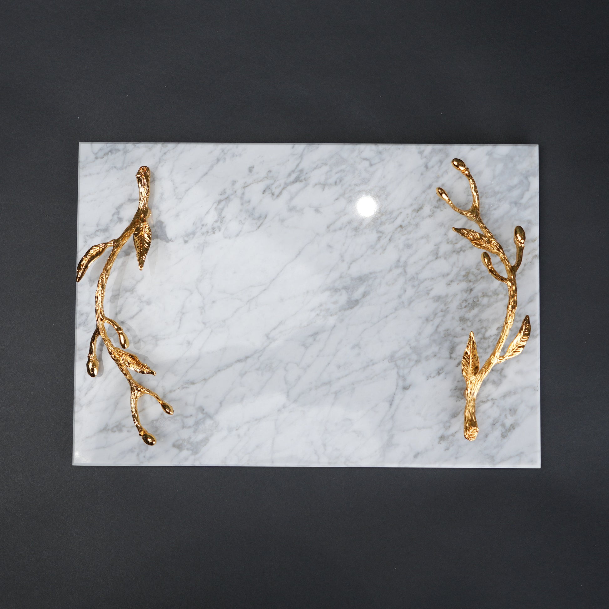 White marble serving platter with gold branch handles for luxury dining and table styling