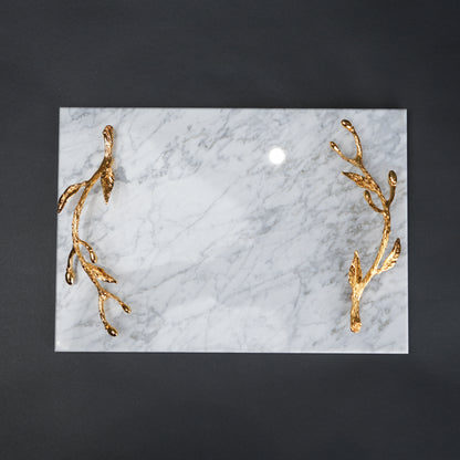 White marble serving platter with gold branch handles for luxury dining and table styling