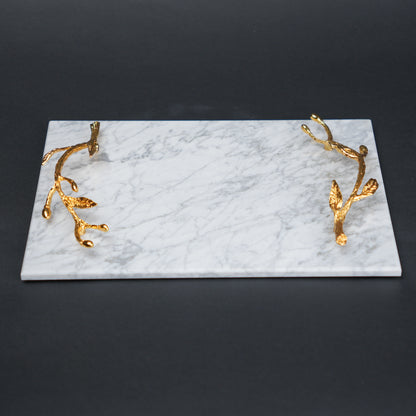 White marble serving platter with gold branch handles for luxury dining and table styling