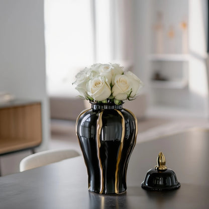 Small noir flow jar w/ roses, grey console