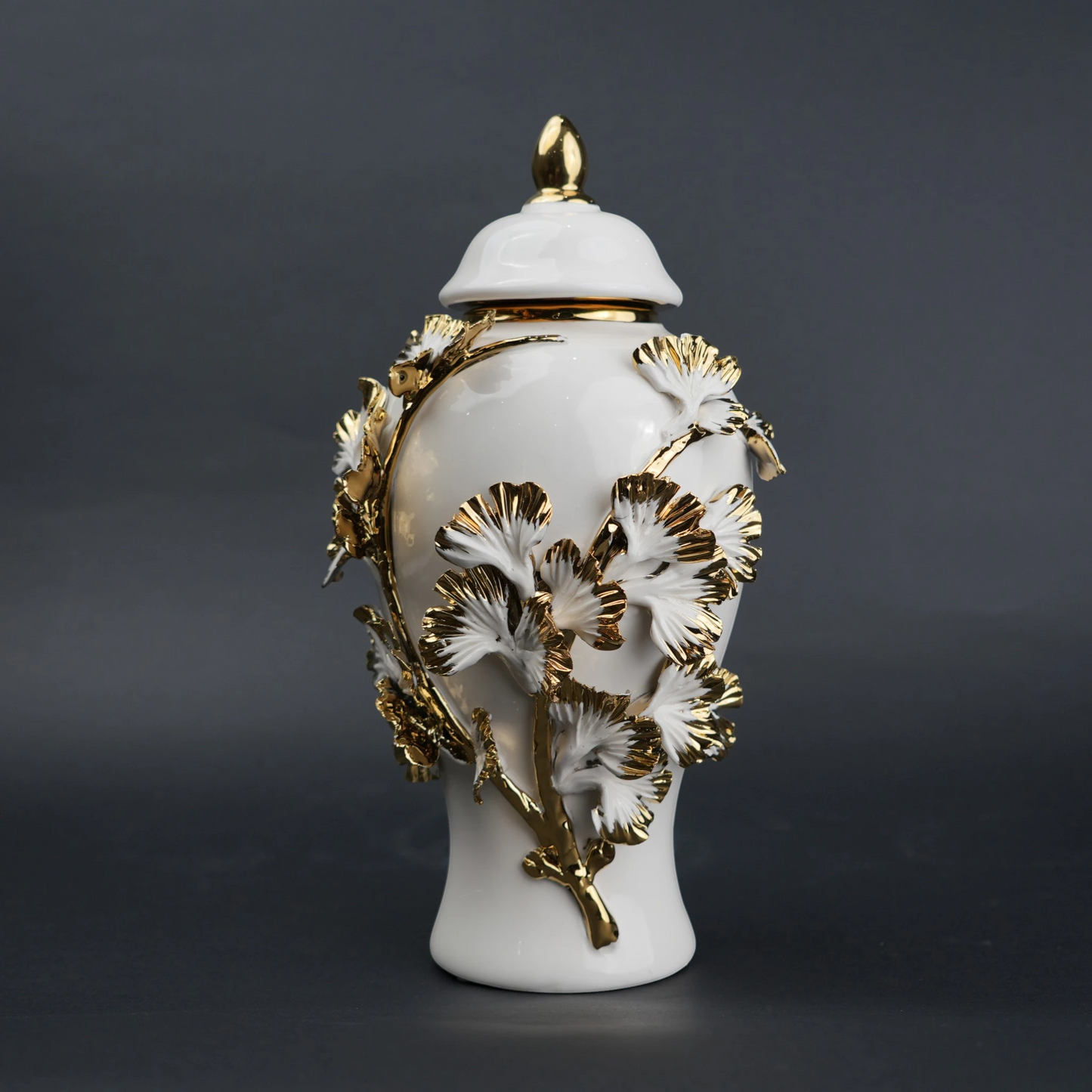 White ceramic jar with gold leaf detailing and lid for luxury home decor styling