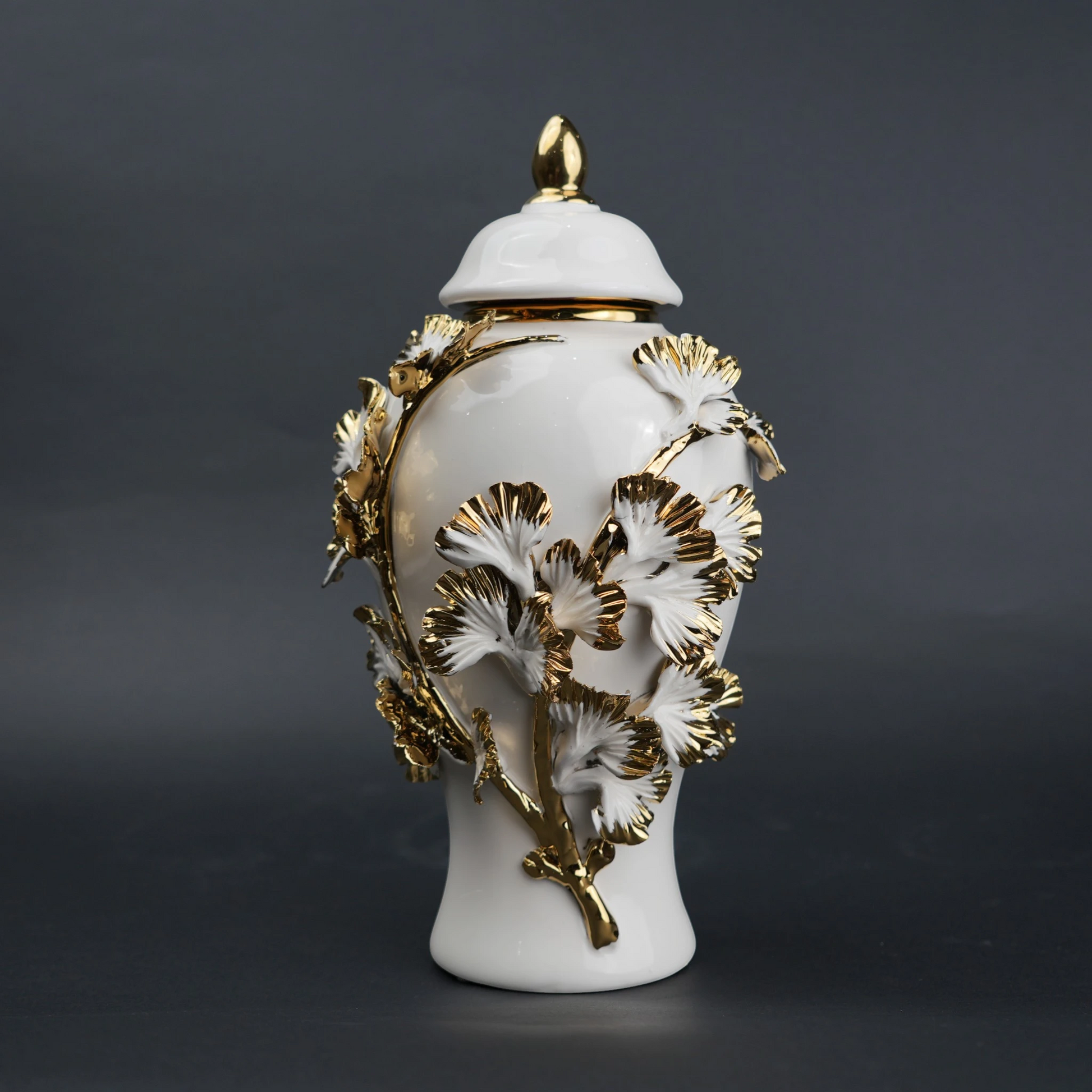 White ceramic jar with gold leaf detailing and lid for luxury home decor styling