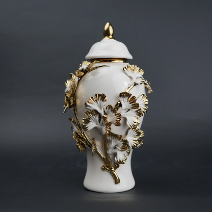 White ceramic jar with gold leaf detailing and lid for luxury home decor styling