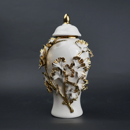White ceramic jar with gold leaf detailing and lid for luxury home decor styling