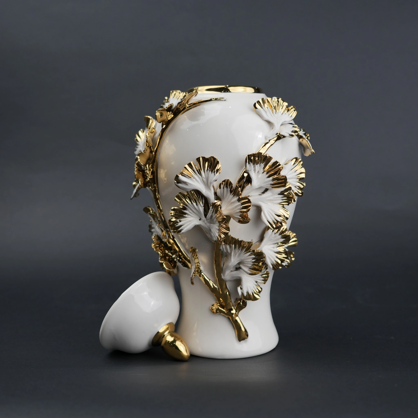 White ceramic jar with gold leaf detailing and lid for luxury home decor styling