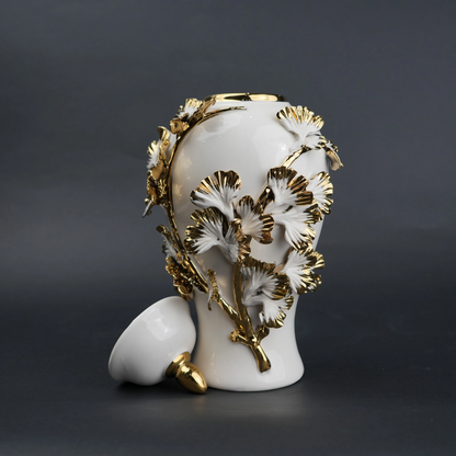 White ceramic jar with gold leaf detailing and lid for luxury home decor styling