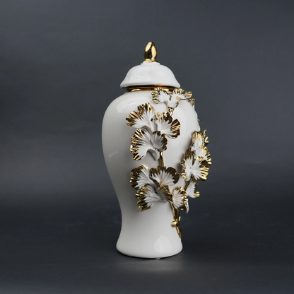 White ceramic jar with gold leaf detailing and lid for luxury home decor styling