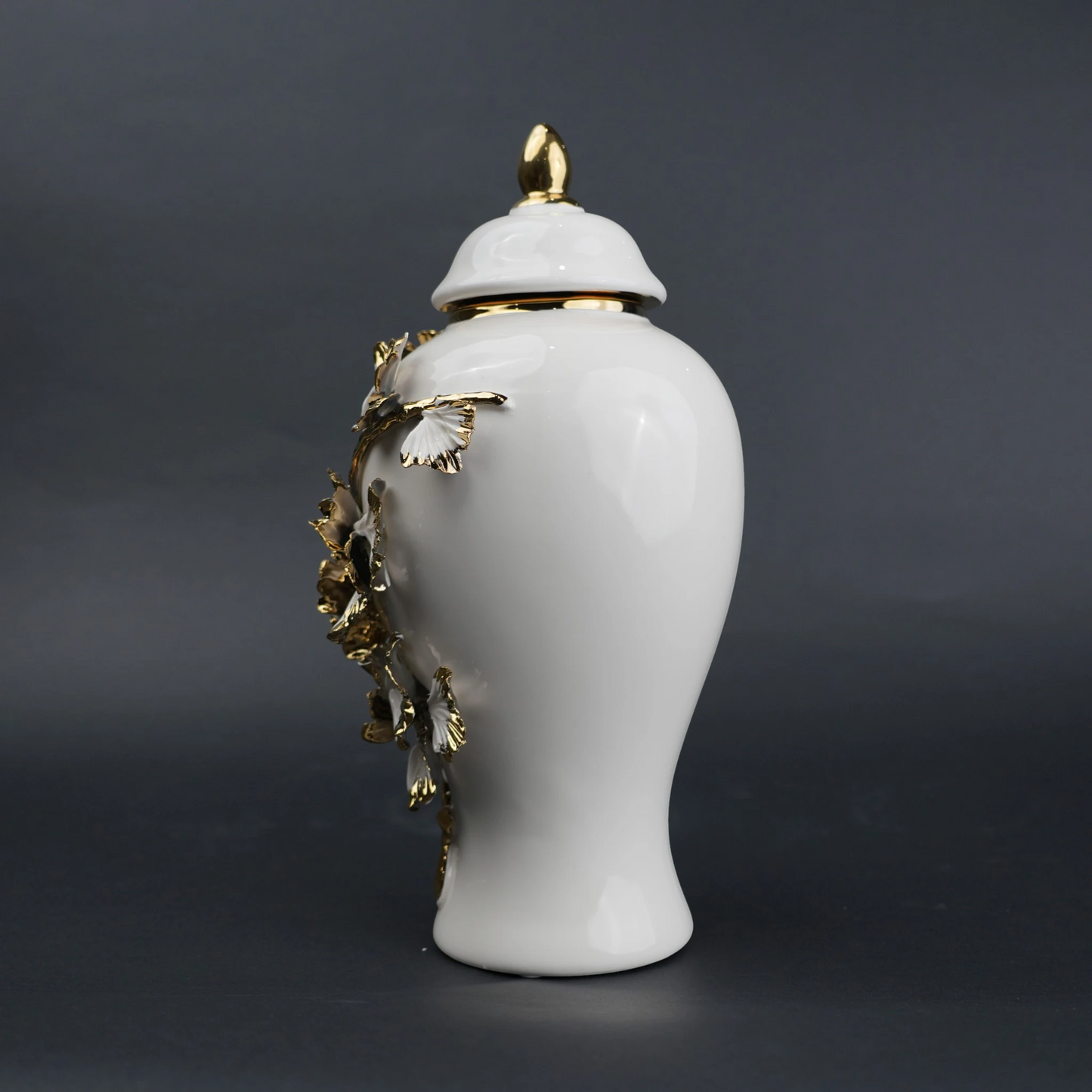 White ceramic jar with gold leaf detailing and lid for luxury home decor styling