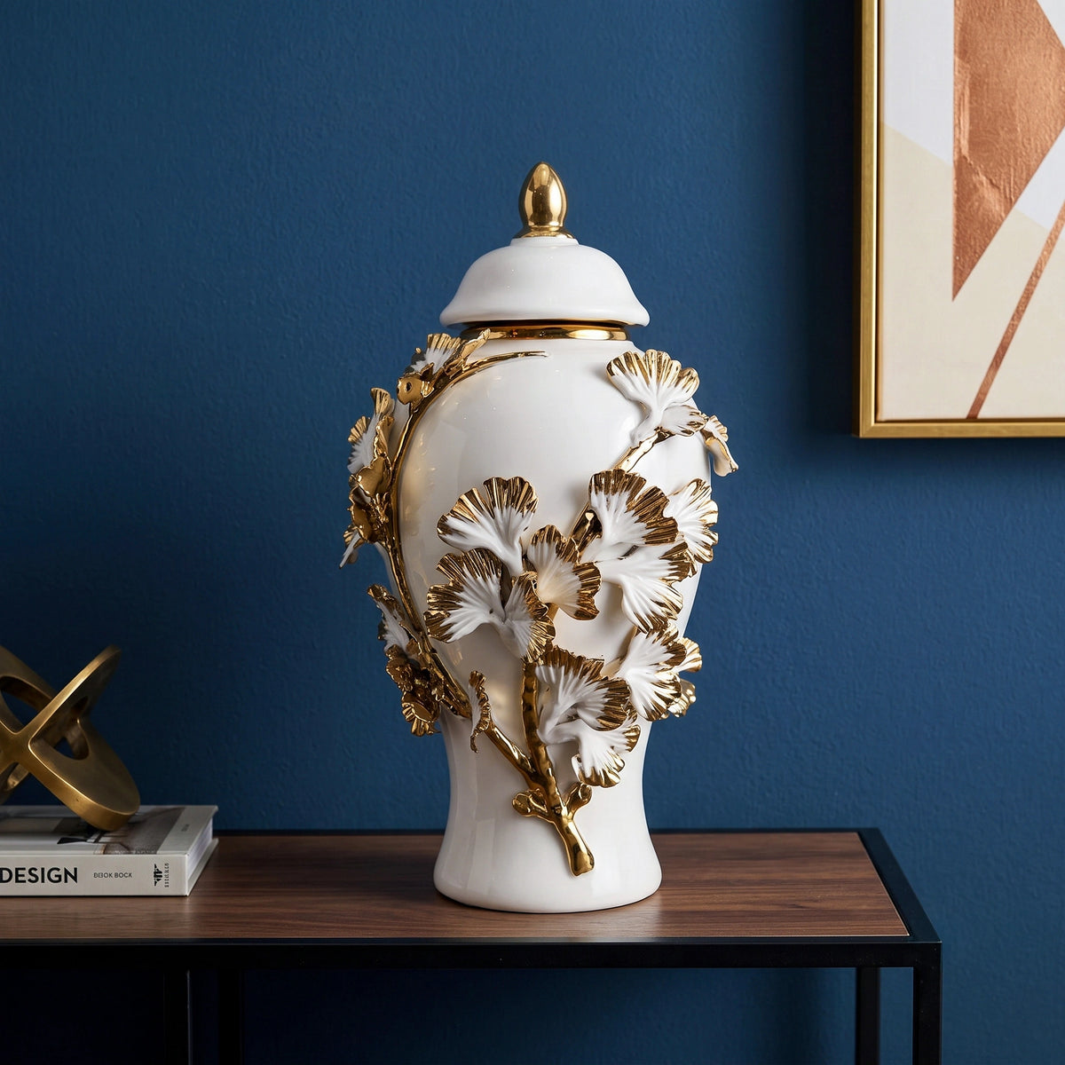 White ceramic jar with gold leaf detailing and lid for luxury home decor styling