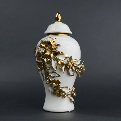 White ceramic jar with gold bloom detailing and lid for decor and flower vase styling