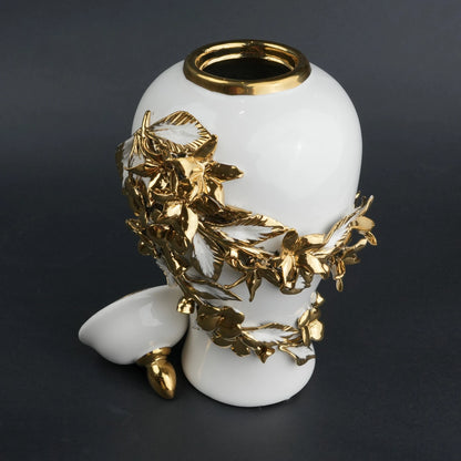 White ceramic jar with gold bloom detailing and lid for decor and flower vase styling