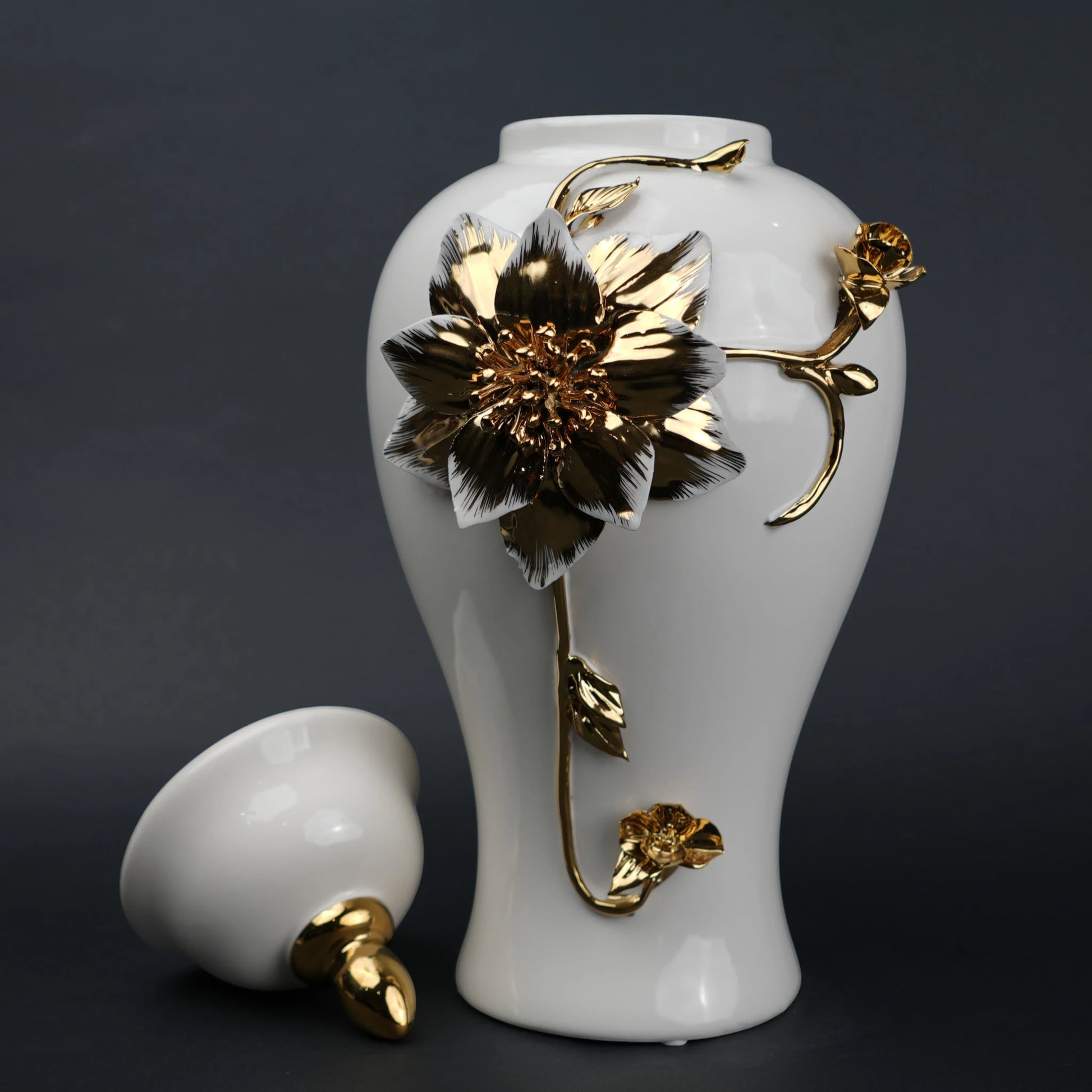 White ceramic jar with gold floral stem design, lid and vase use for home decor styling