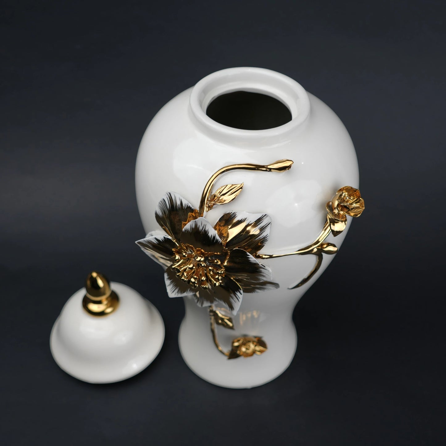 White ceramic jar with gold floral stem design, lid and vase use for home decor styling