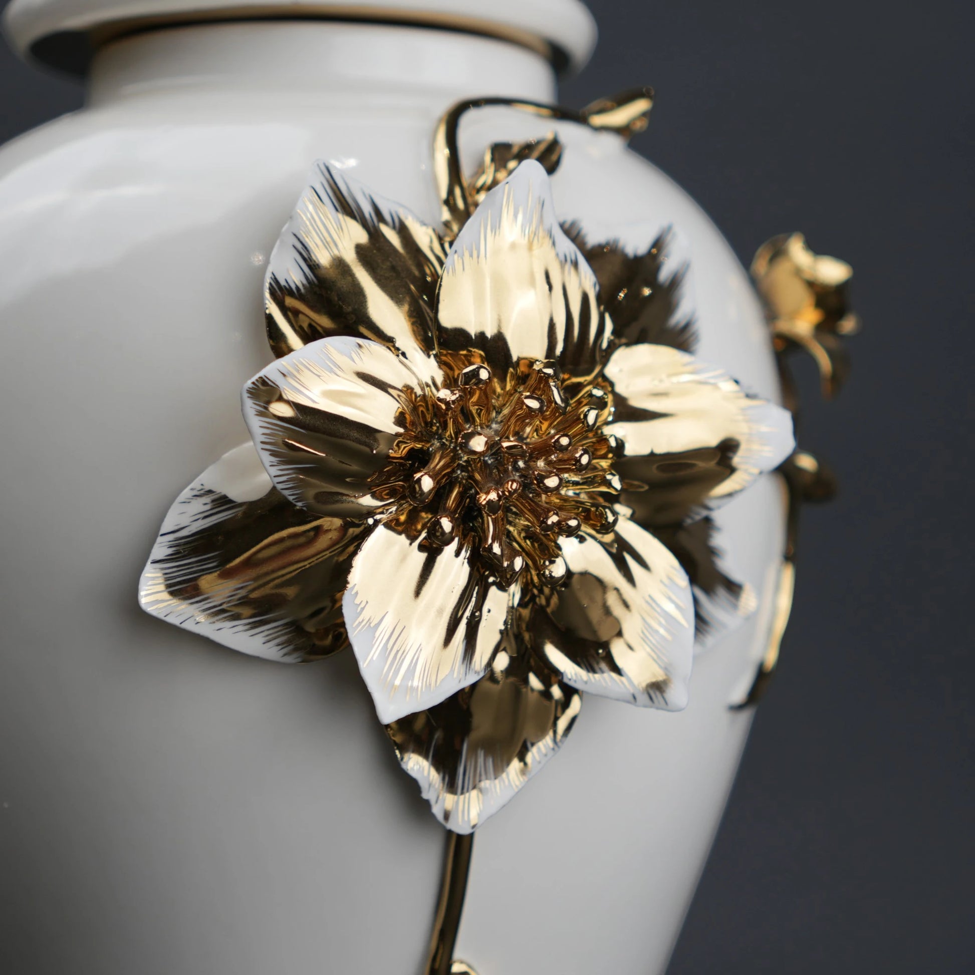 White ceramic jar with gold floral stem design, lid and vase use for home decor styling